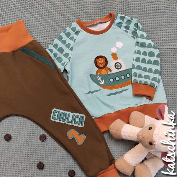 Bio Jersey Stoff Geburtstagspanel Boot mit Löwe – Kinderjersey Meterware