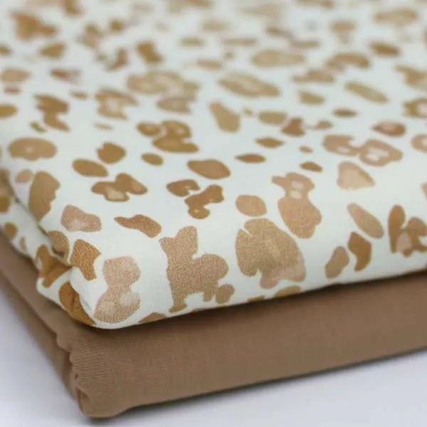 Kinder Jersey Stoff mit Leomuster– elastischer Baumwollstoff für Baby- und Kinderbekleidung