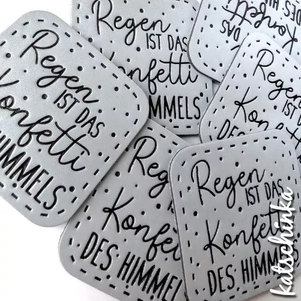 Reflektierendes Kunstleder Label - Regen ist das Konfetti des Himmels!