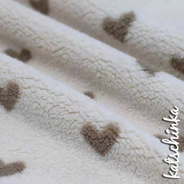 teddystoff meterware kaufen, weicher teddystoff online, teddyplüsch stoff für babydecke, teddystoff für jacken nähen, plüschstoff für winterkleidung, fleece stoff für nähprojekte, teddystoff für accessoires, meterware teddystoff online shop, teddystoff fü