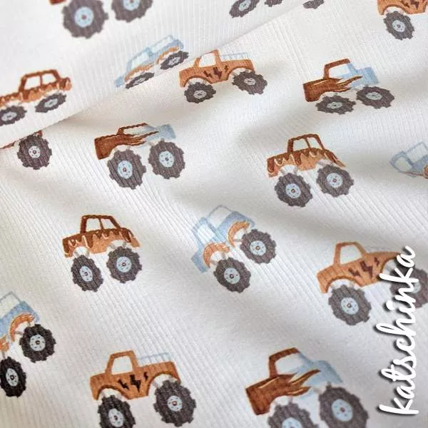Rippenjersey mit Motiv auf hellem Hintergrund – weicher Ribjersey Kinderstoff mit Polizeiautos als Detailaufnahme