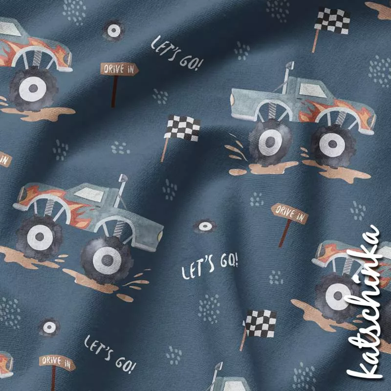 Baumwolljersey Stoff mit Monstertruck Motiv auf blauem Hintergrund – Kinderstoff als Meterware für coole Nähprojekte