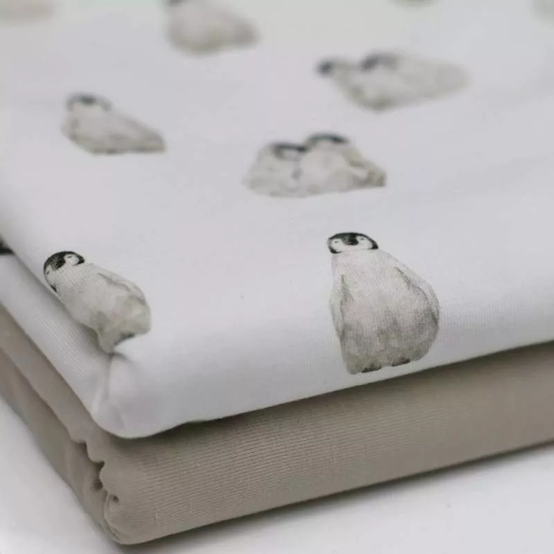 Baumwolljersey Stoff mit Dinosaurier Motiv in Naturtönen auf ecru Hintergrund – Kinderstoff als Meterware zum Nähen von Baby- und Kinderkleidung