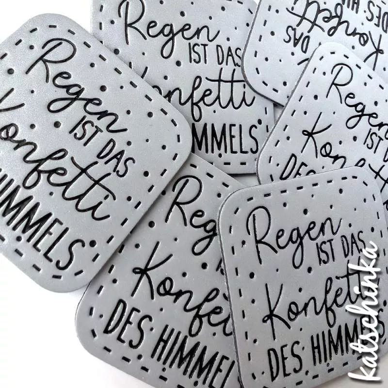 Reflektierendes Kunstleder Label - Regen ist das Konfetti des Himmels!