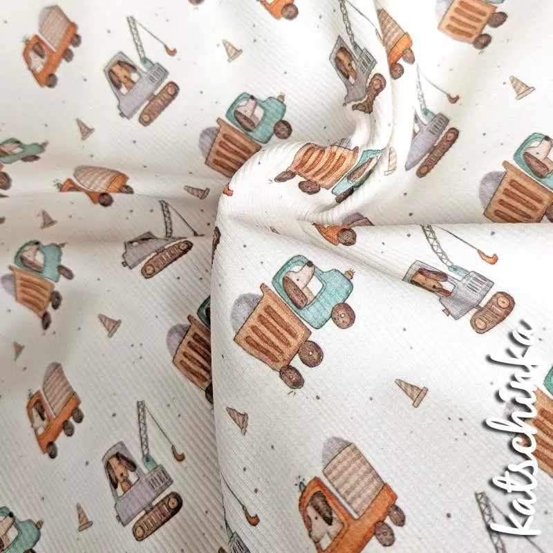 Rippenjersey mit Motiv auf hellem Hintergrund – weicher Ribjersey Kinderstoff mit Polizeiautos als Detailaufnahme