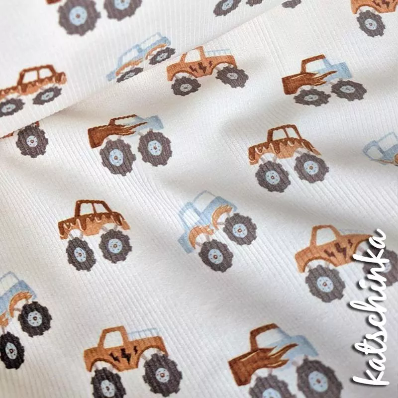 Rippenjersey mit Motiv auf hellem Hintergrund – weicher Ribjersey Kinderstoff mit Polizeiautos als Detailaufnahme